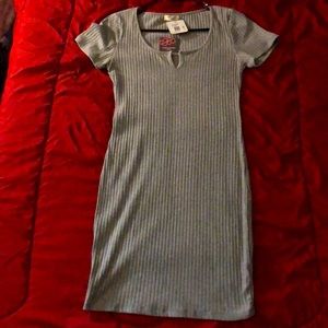 Grey light sweater type dress. NWT med. size.